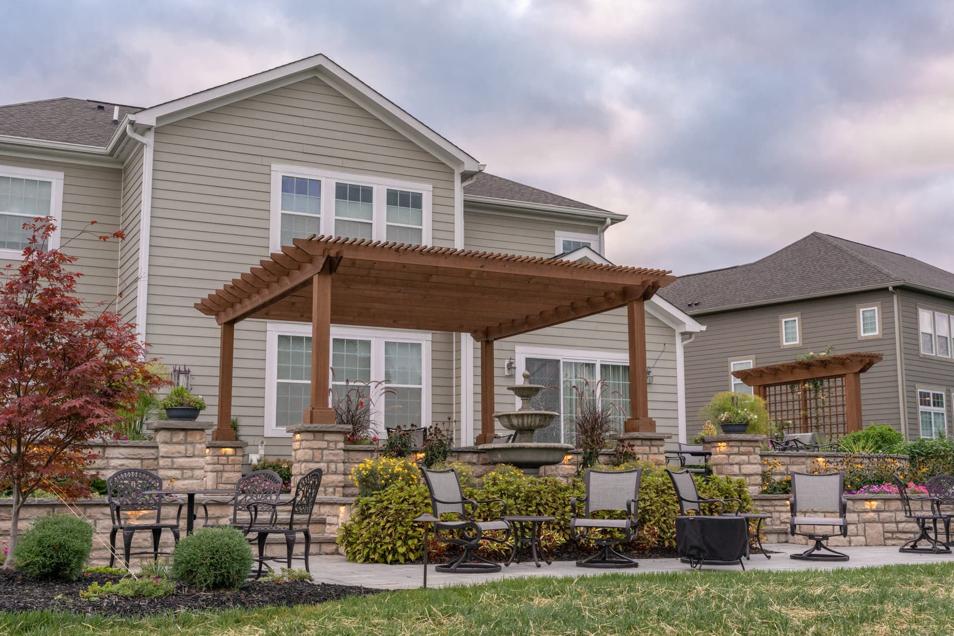 Outback pergola with arbor and privacy wall in cedartone stain